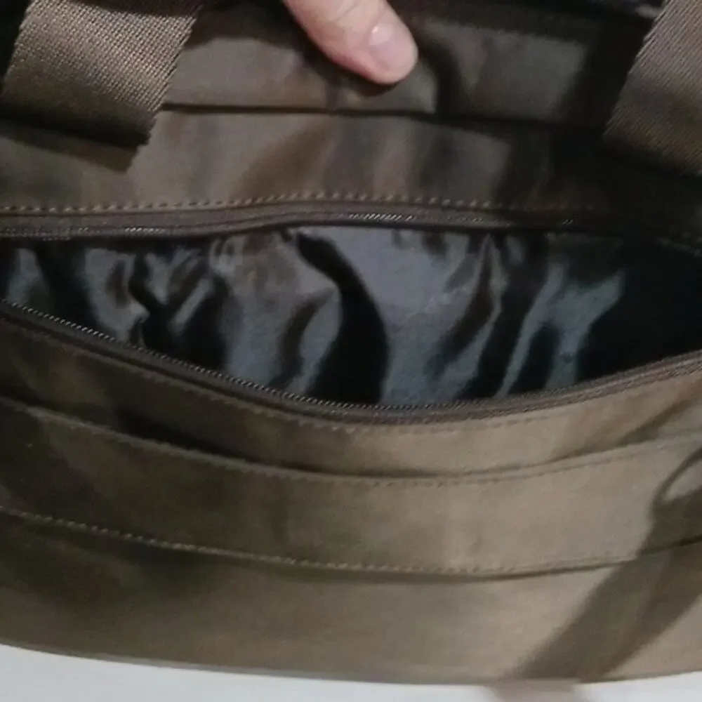 Lipault brown padded laptop bag EUC